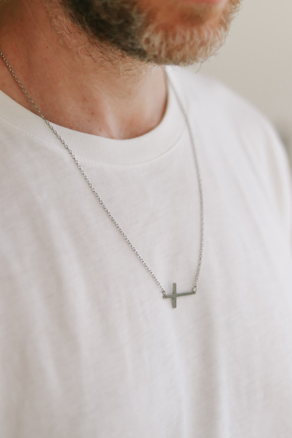 Sideways cross necklace for men