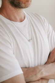 Sideways cross necklace for men