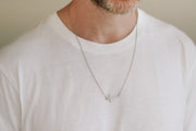 Sideways cross necklace for men
