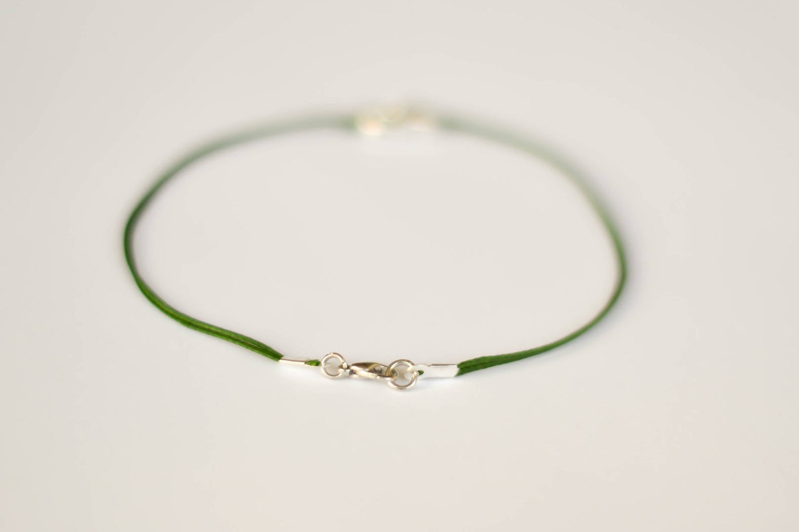 Silver fish bead anklet for men, green cord - shani-adi-jewerly