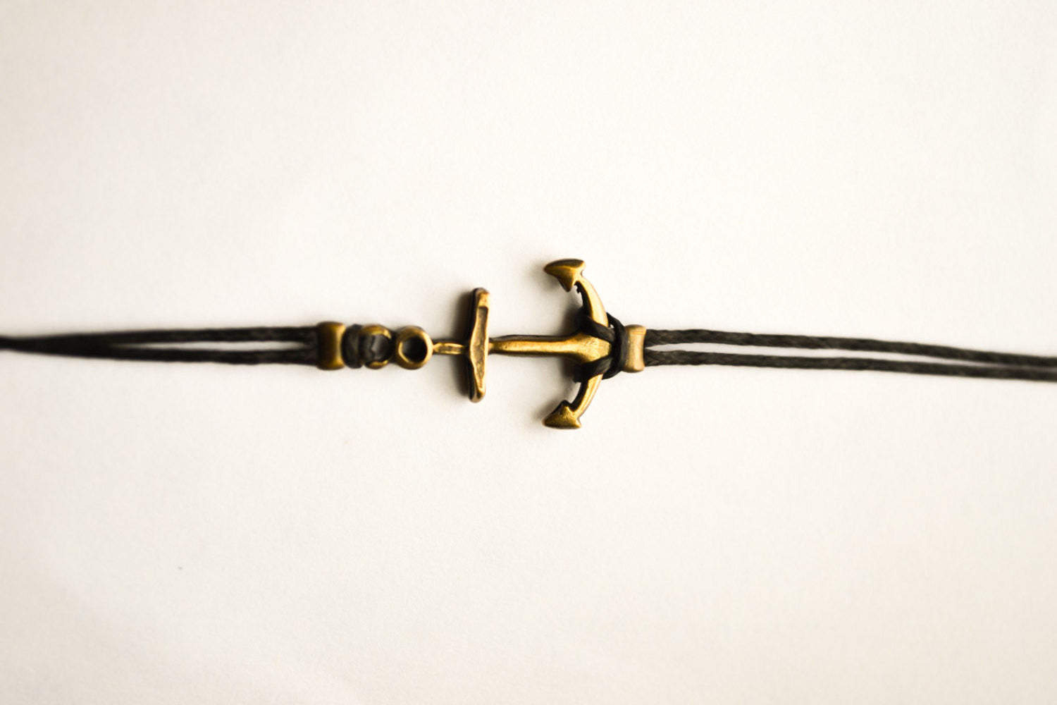 Men's bracelet with a bronze anchor charm, black cord - shani-adi-jewerly