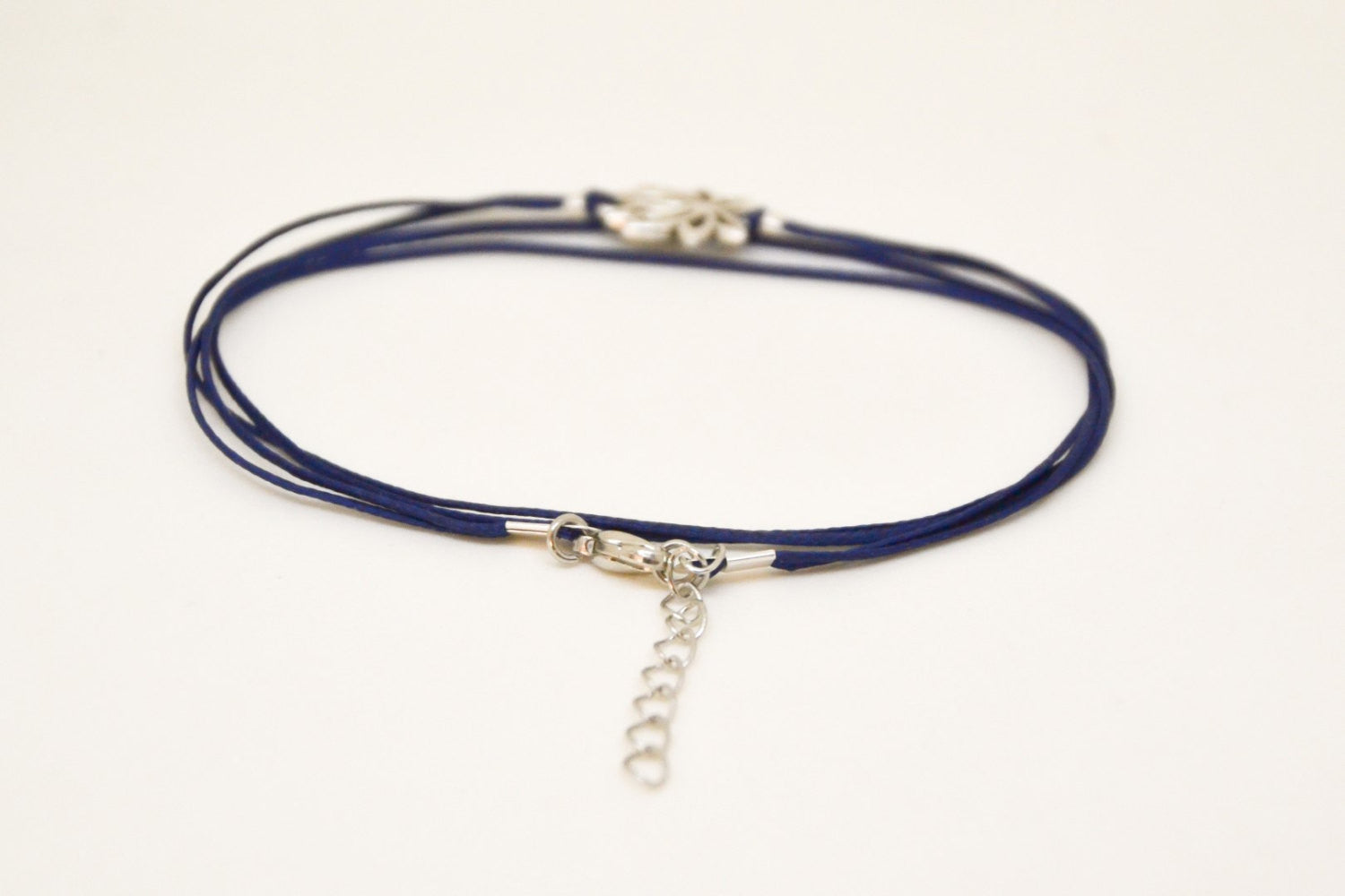 Lotus wrapped anklet with blue cord - shani-adi-jewerly