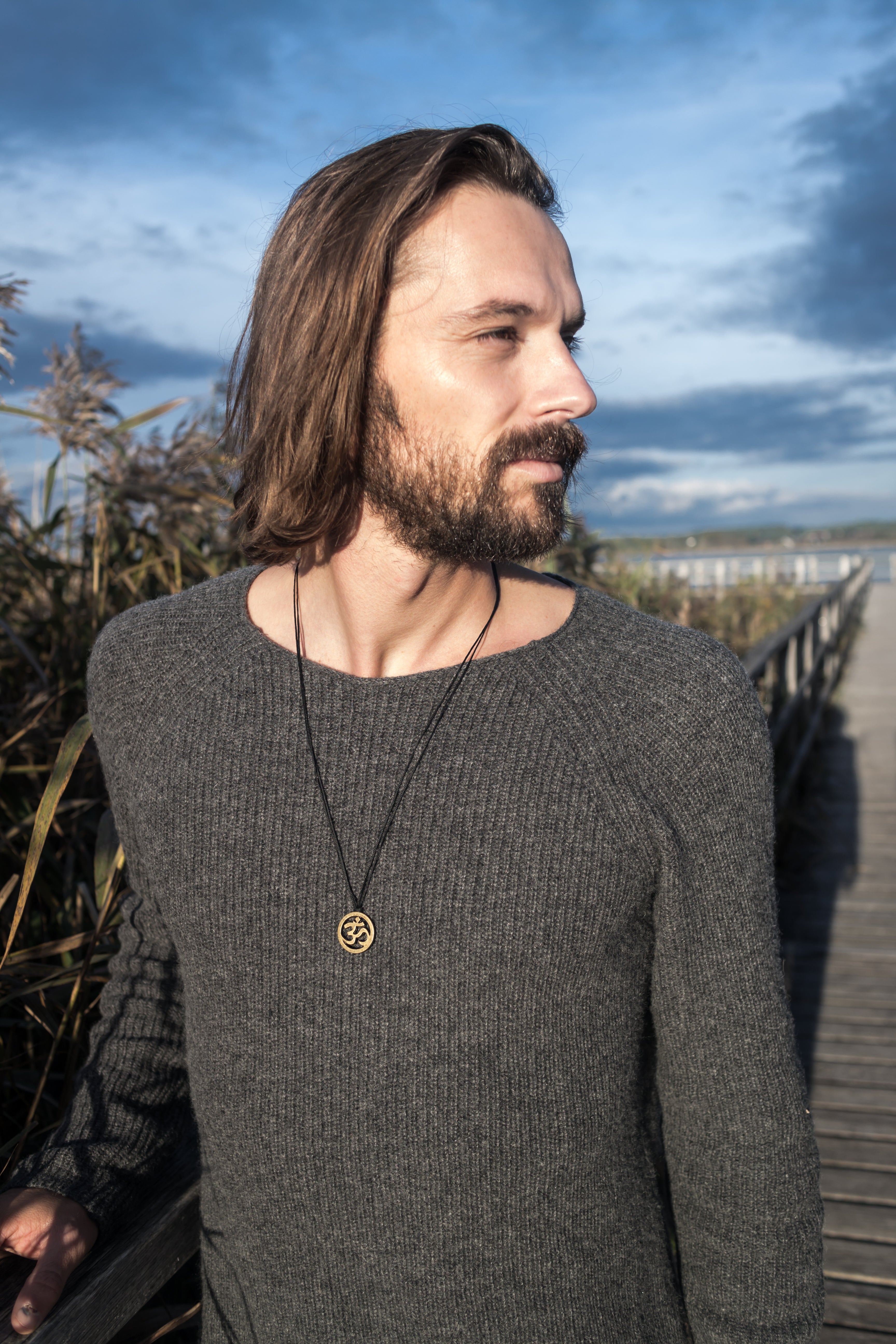 Men's necklace with a black cord and a bronze ohm pendant, Om