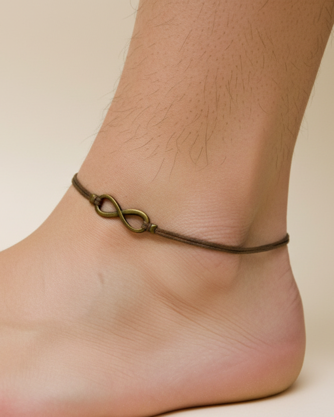 Men's anklet with a bronze tone infinity charm and a brown cord