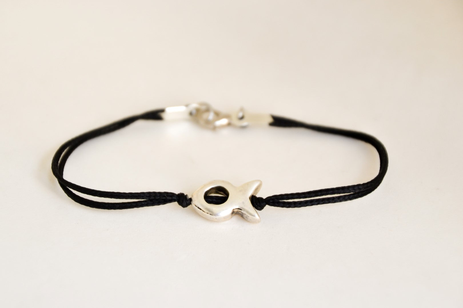 Men's Bracelet with a Silver Tone Fish Bead Charm, Black Cord