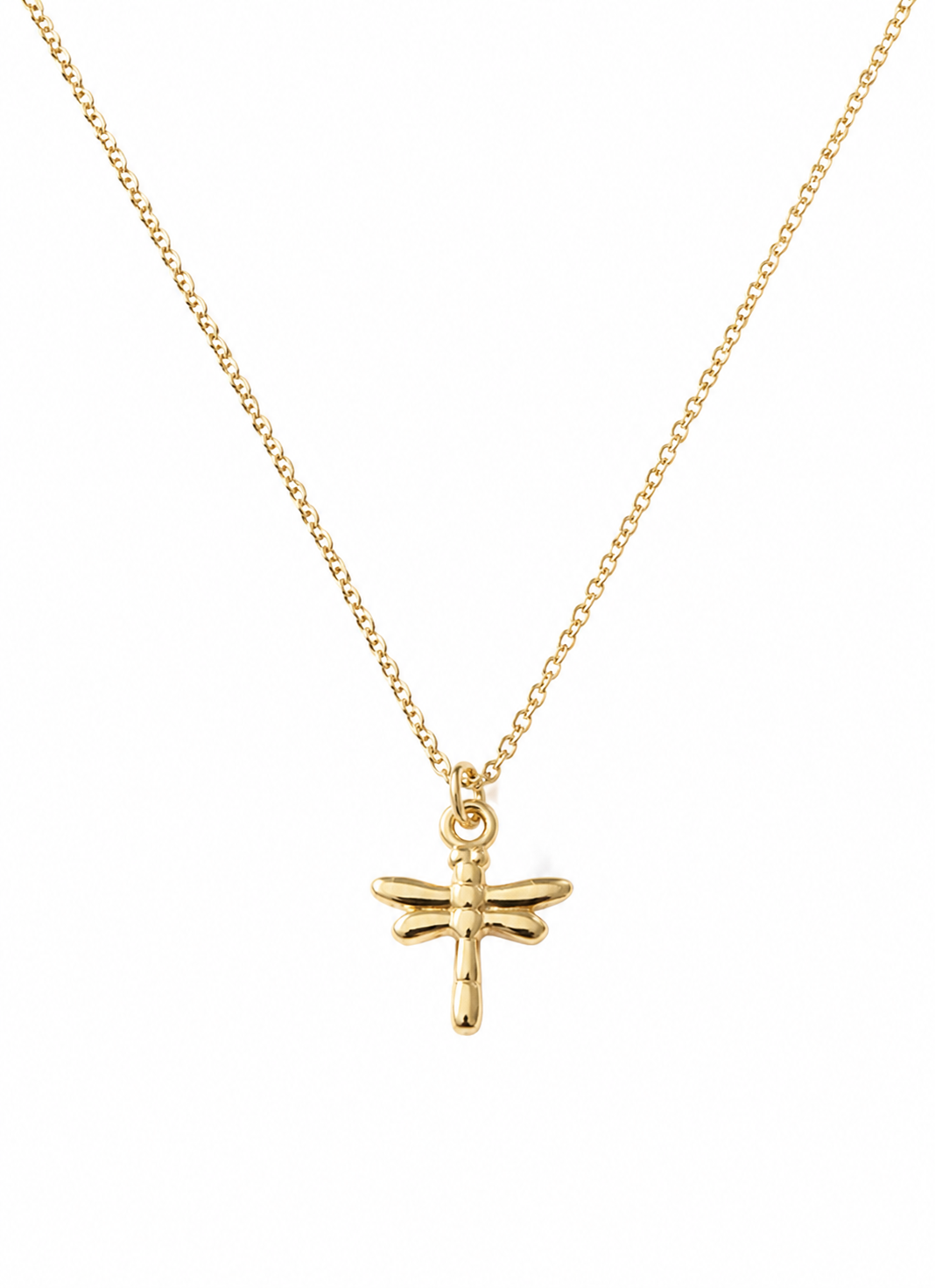 Gold necklace with a dragonfly pendant on a white background