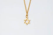 Gold necklace with a Star of David pendant for men