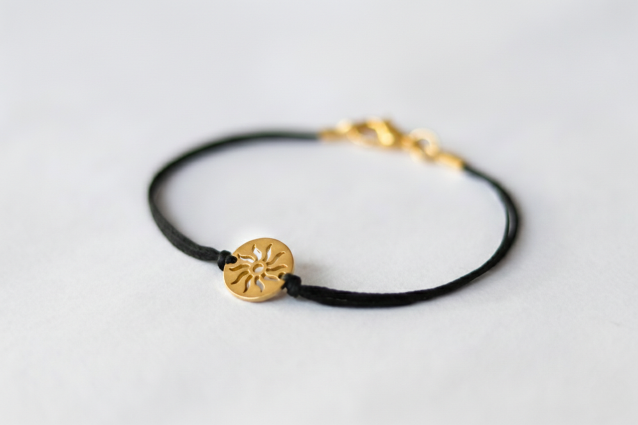 Sun bracelet for men with gold tone stainless steel sun charm, waterproof custom color and size string, black cotton strand