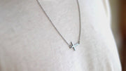 Sideways cross necklace for men