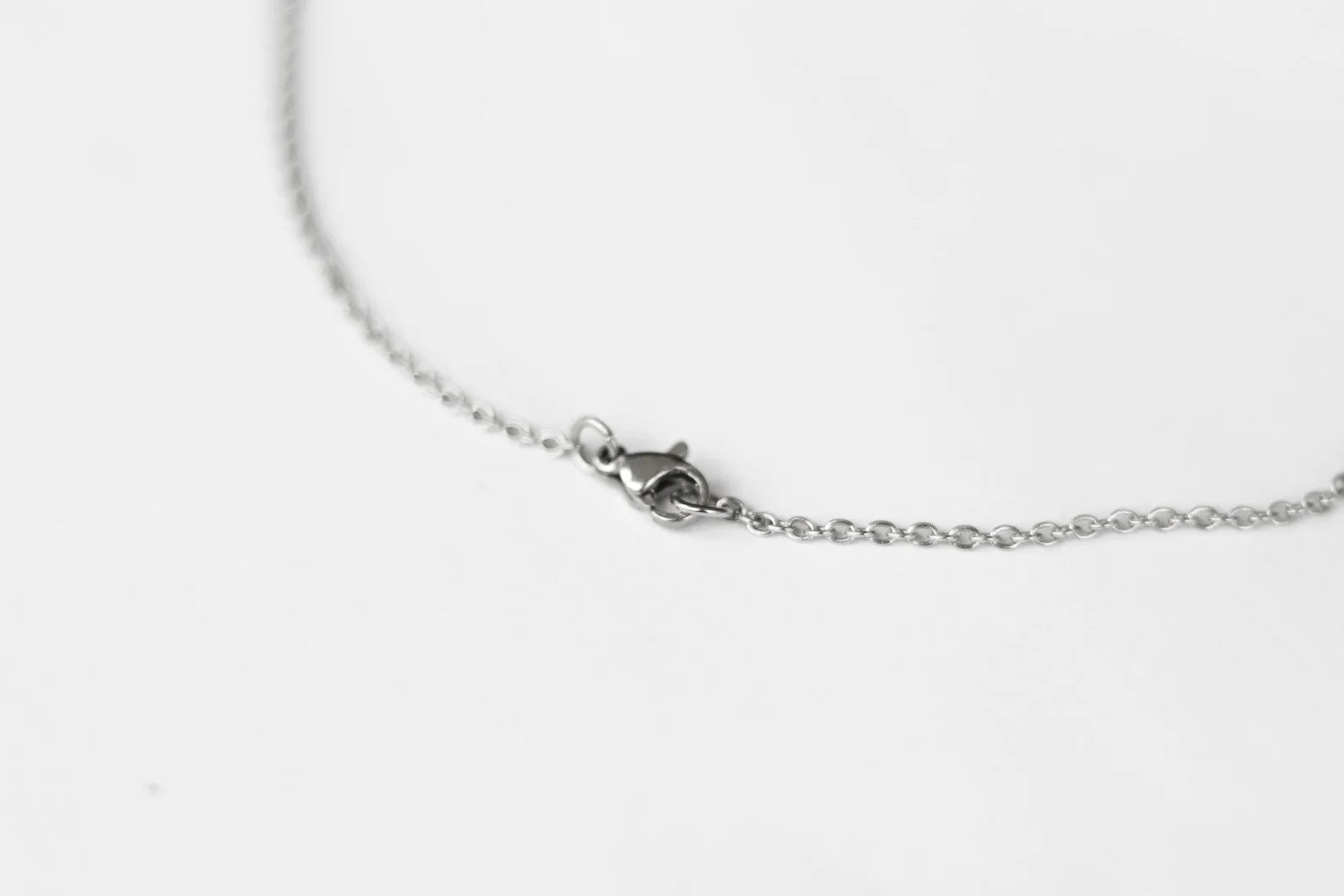 Sideways cross necklace for men