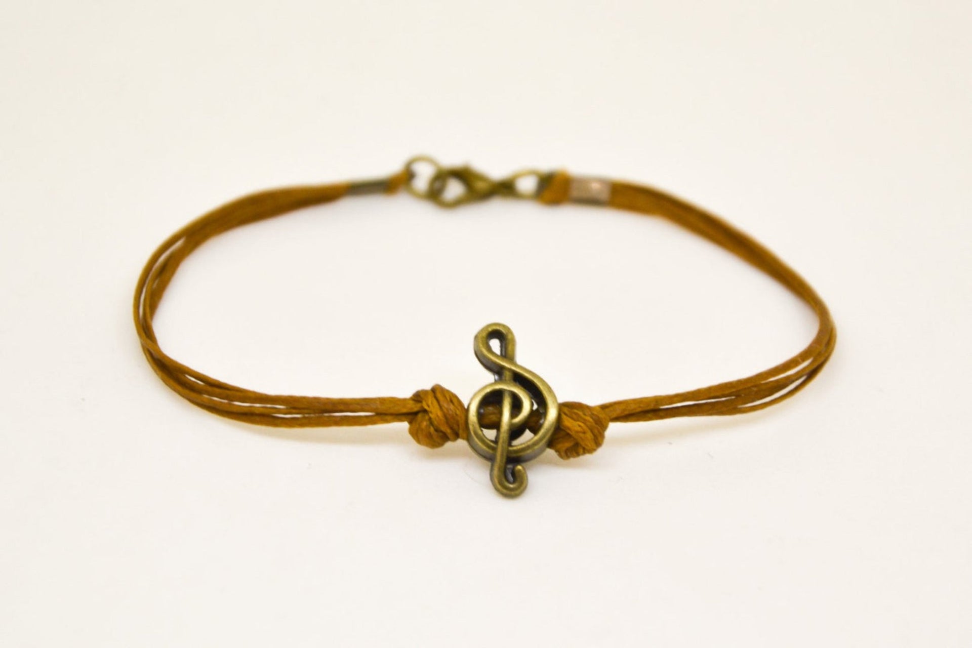 Bronze Treble clef bracelet for men, brown cords - shani-adi-jewerly