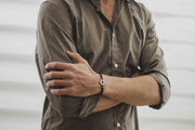 Bracelet for men, silver oval charm, black cord - shani-adi-jewerly