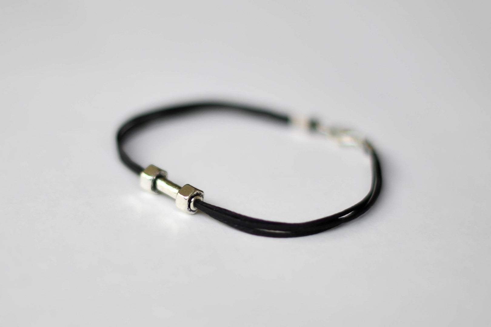 Silver Dumbbell bracelet for men, black cord, weights charms, workout jewelry for him - shani-adi-jewerly