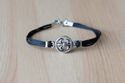 Silver Fleur de lis bracelet for men, black cord - shani-adi-jewerly