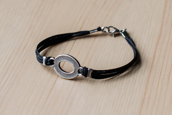 Bracelet for men, silver oval charm, black cord - shani-adi-jewerly