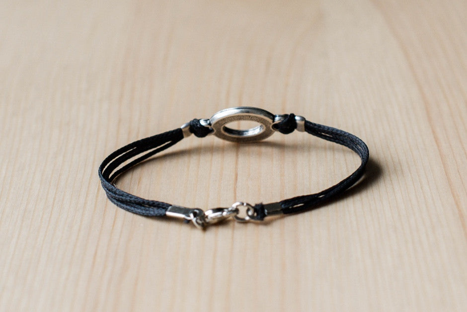 Bracelet for men, silver oval charm, black cord - shani-adi-jewerly