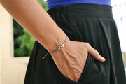 Women bracelet with silver cross charm, Gray cord - shani-adi-jewerly