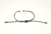 Silver cross charm bracelet, gray cord, adjustable sliding knot - shani-adi-jewerly
