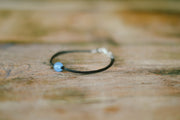 Aquamarine bracelet for men, blue March birthstone, black cord - shani-adi-jewerly