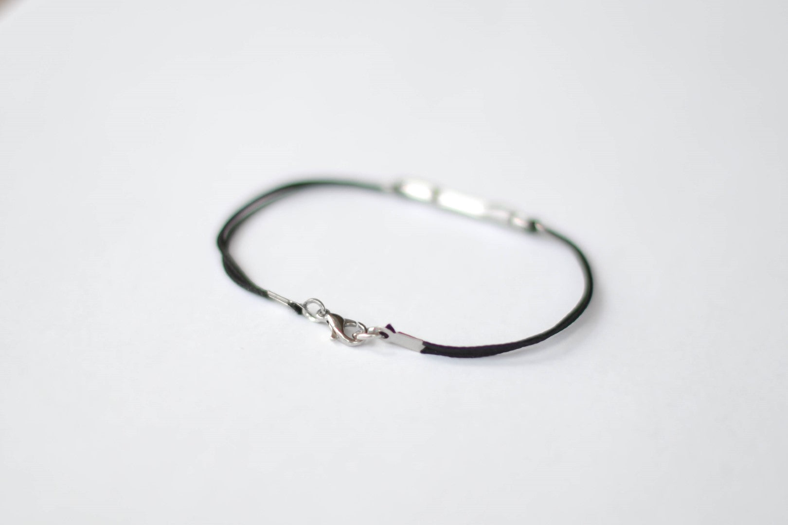 Silver arrow bracelet for men, black cords - shani-adi-jewerly