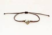 Men's bracelet with bronze Om charm, brown cord - shani-adi-jewerly