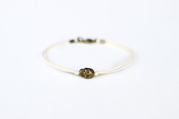 Bronze skull bead bracelet for men, beige cord, gift for him