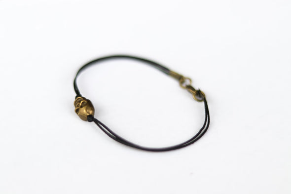 Bronze skull bead bracelet for men, black cord, gift for him