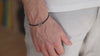 silver Sun bracelet for men black string