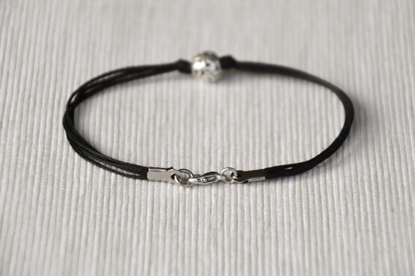 Men's bracelet with silver bead charm and a black cord - shani-adi-jewerly