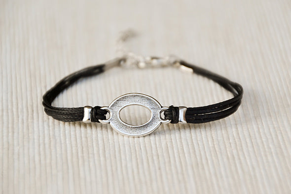Black cord bracelet with a silver oval circle charm, Mothers day gift - shani-adi-jewerly