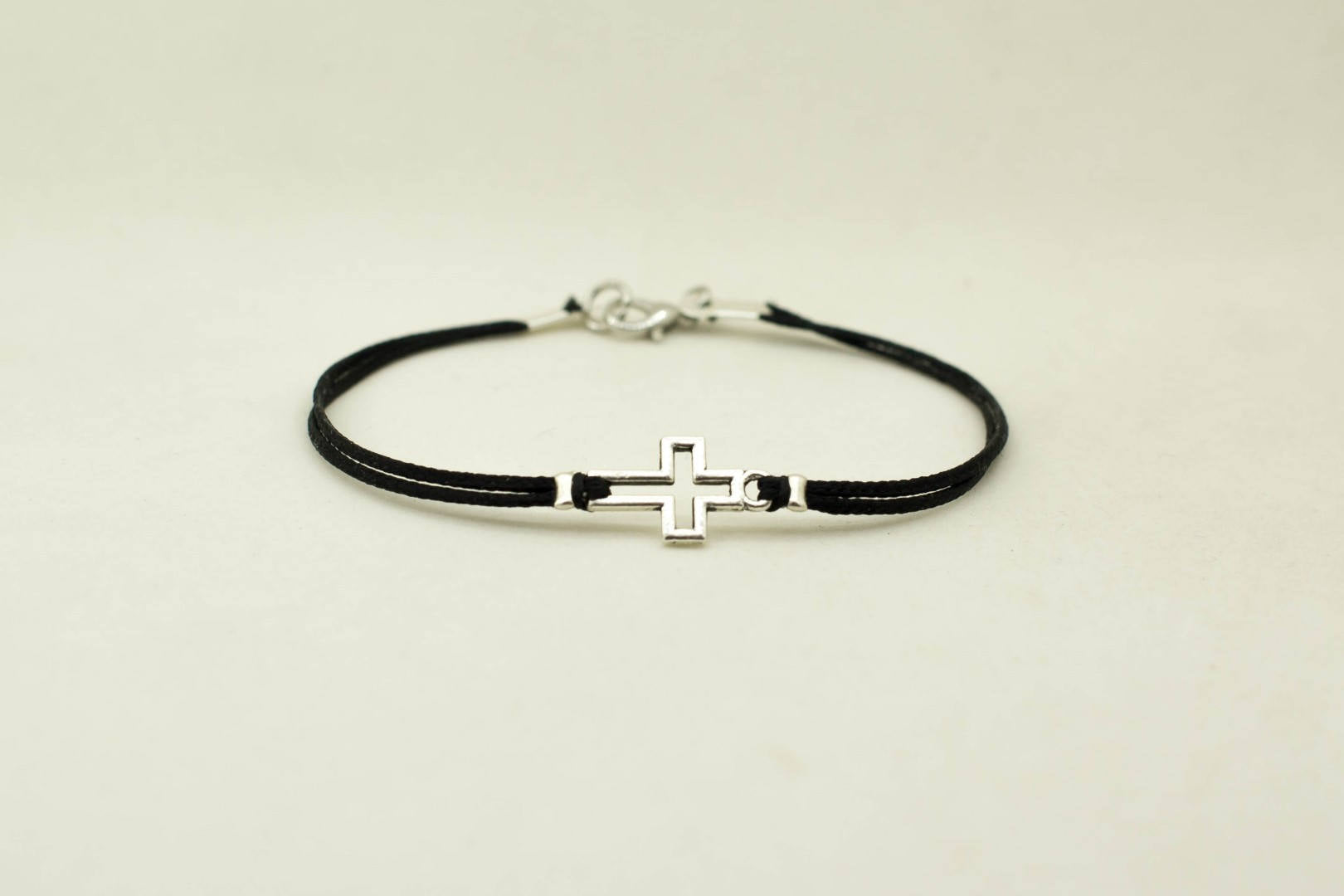 Men's bracelet with silver outline cross pendant - shani-adi-jewerly