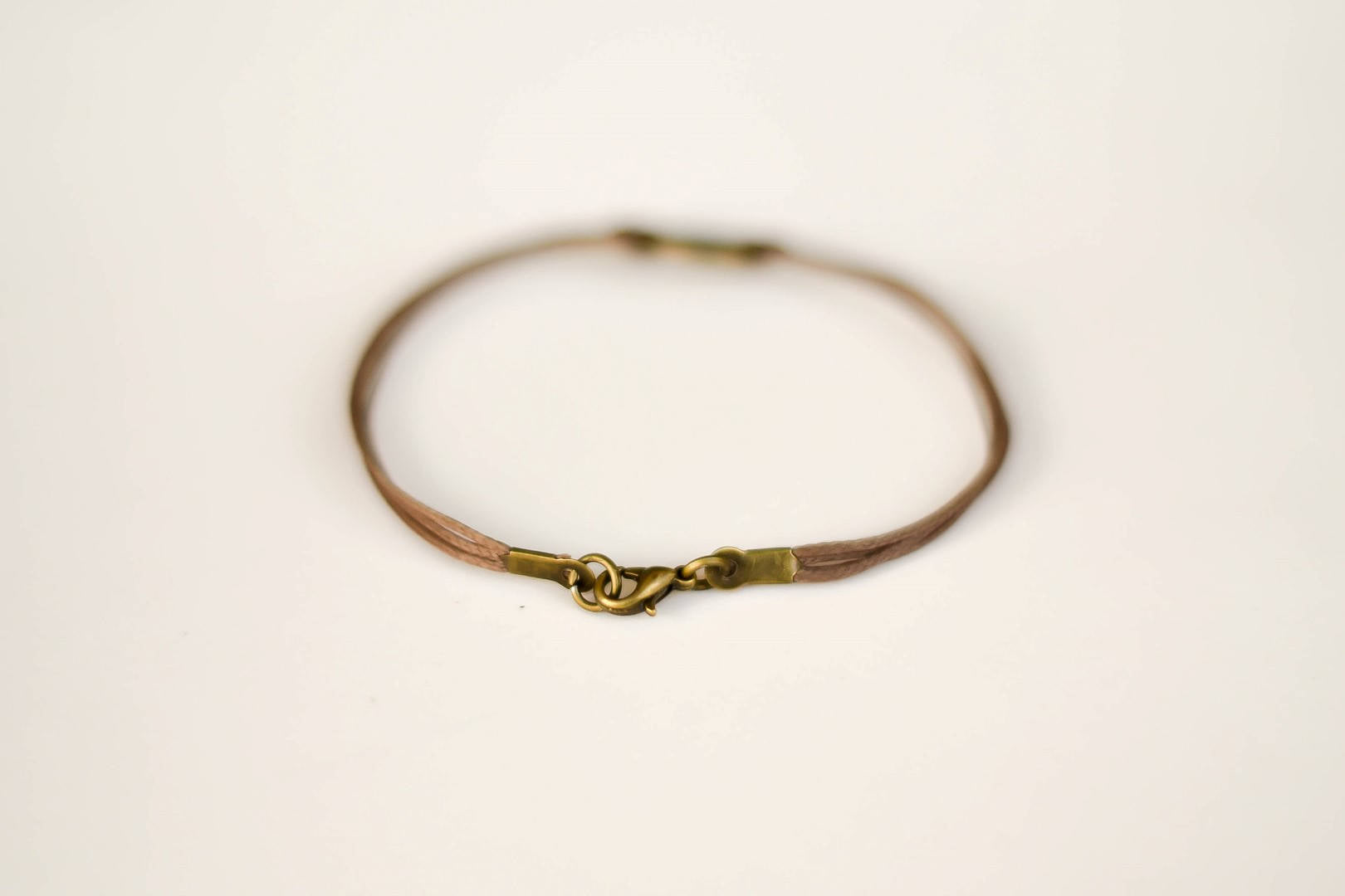 Bronze circle Believe bracelet for men, brown cord, Karma bracelet, fathers gift for him - shani-adi-jewerly