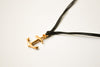 Gold anchor necklace with a black wax cord - shani-adi-jewerly