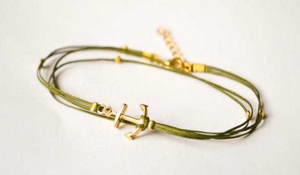 Green dainty anklet with a gold anchor charm and gold beads - shani-adi-jewerly