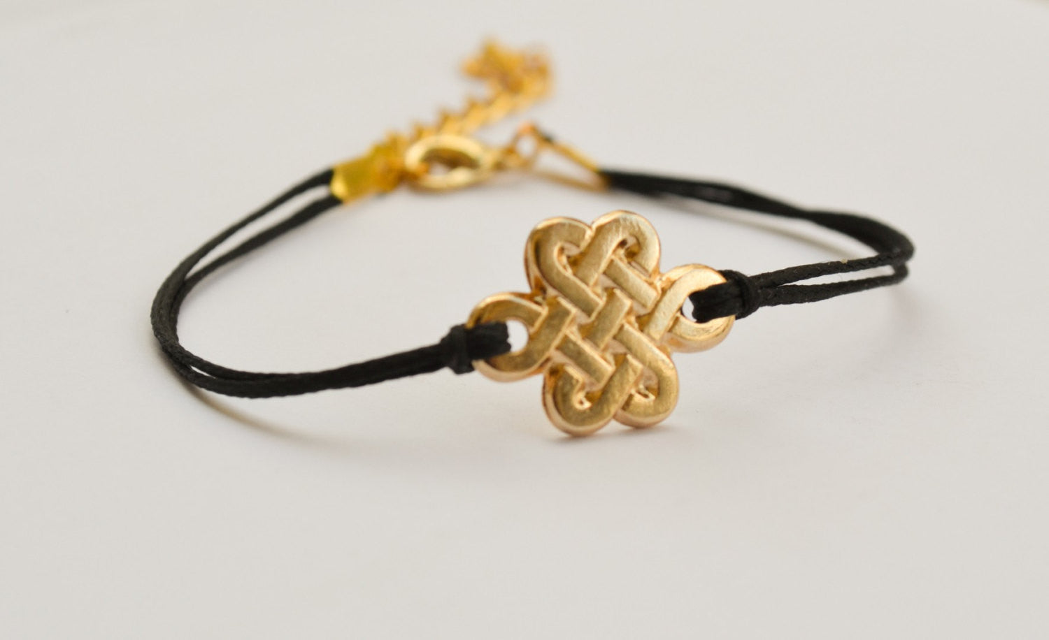 Gold Infinity bracelet for women, endless celtic knot bracelet, black string - shani-adi-jewerly