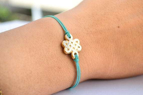 Turquoise cord bracelet with gold endless knot charm - shani-adi-jewerly