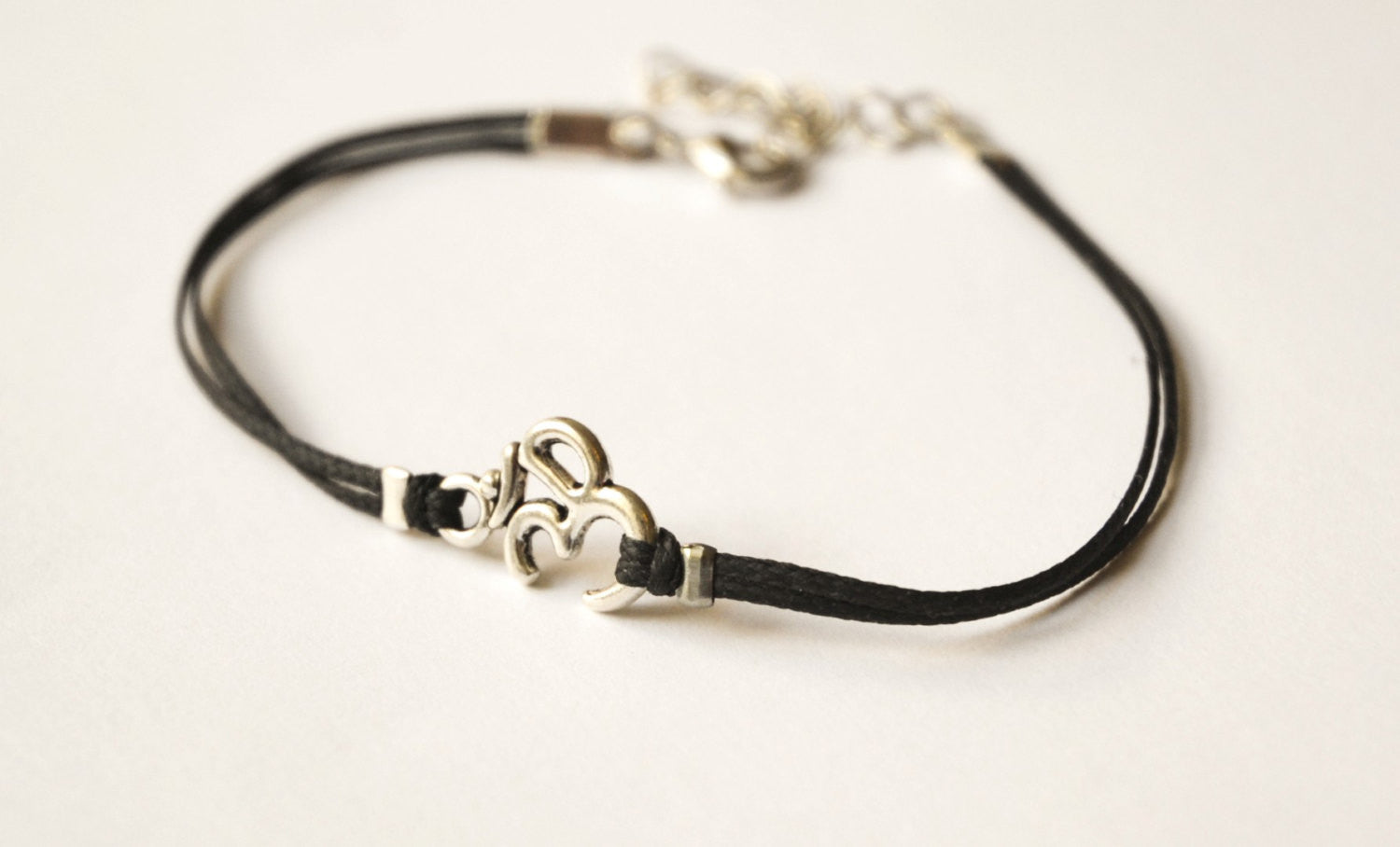Dainty black cord anklet with silver Om charm - shani-adi-jewerly