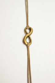 Brown cord bracelet with a bronze endless charm - shani-adi-jewerly
