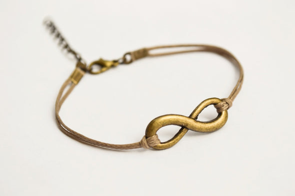 Brown cord bracelet with a bronze endless charm - shani-adi-jewerly