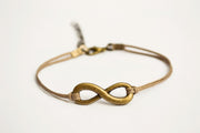 Brown cord bracelet with a bronze endless charm - shani-adi-jewerly
