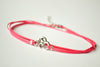 Om wrap anklet, pink cord - shani-adi-jewerly