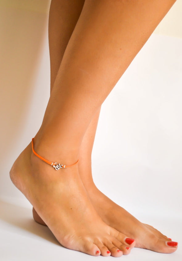 Orange cord anklet with silver Om charm - shani-adi-jewerly