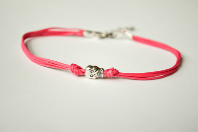 Pink cord bracelet with a silver skull charm - shani-adi-jewerly