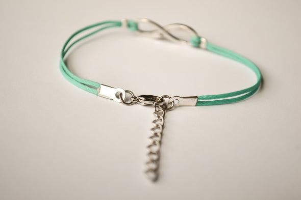 turquoise cord bracelet with a silver infinity charm - shani-adi-jewerly