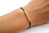 Gold bar bracelet, black cord - shani-adi-jewerly