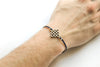 Silver Infinity bracelet for men, black cord - shani-adi-jewerly