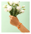 Orange cord bracelet with a gold circle charm - shani-adi-jewerly