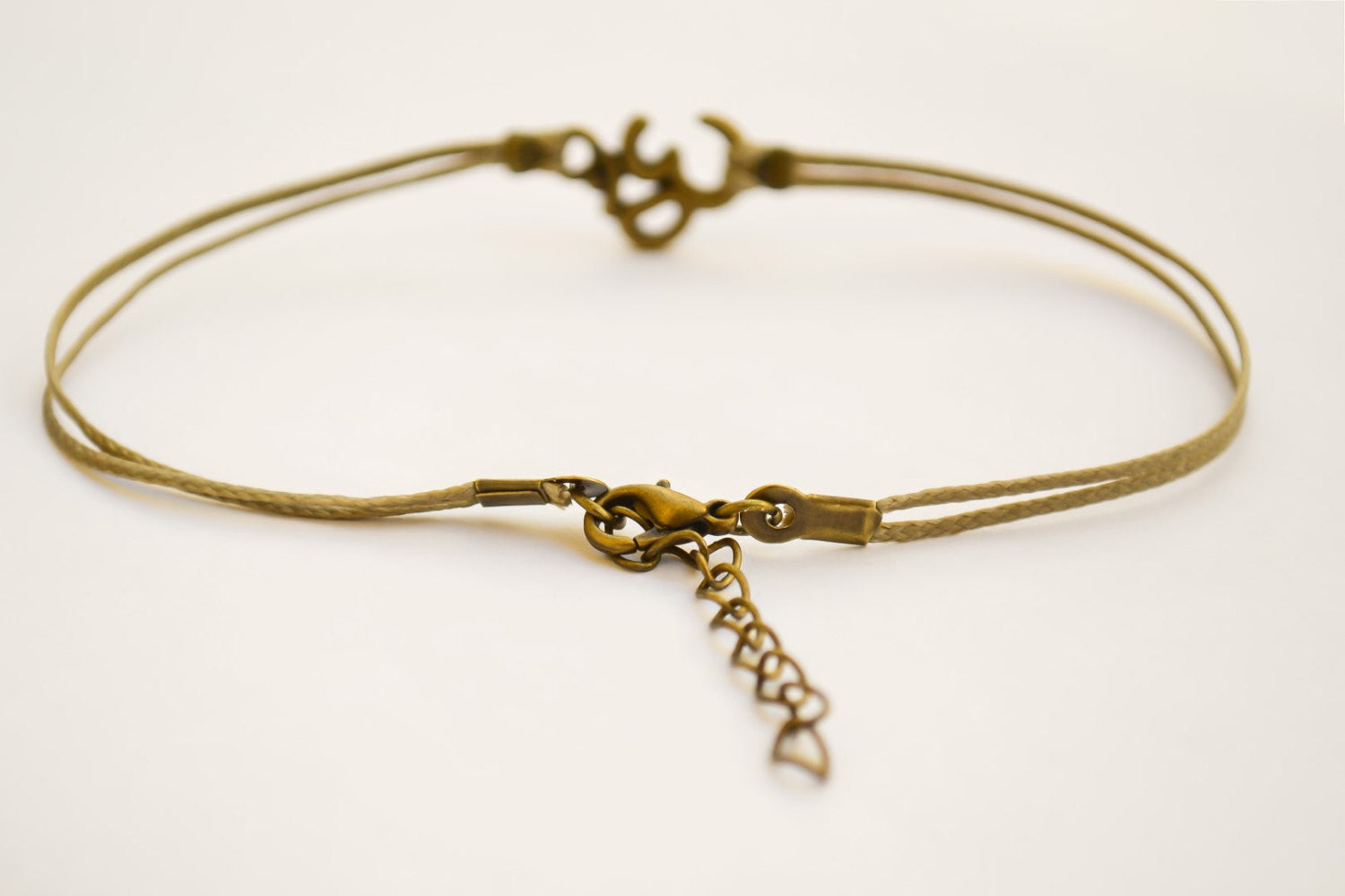Bronze om anklet, brown cord - shani-adi-jewerly