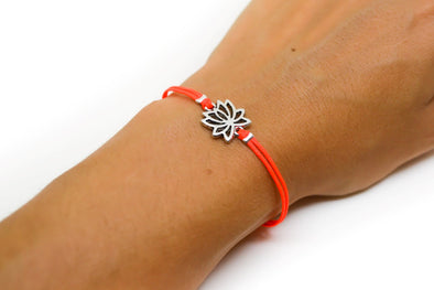 Bright peach cord bracelet with silver lotus charm - shani-adi-jewerly