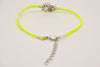 Neon yellow cord bracelet with silver lotus charm - shani-adi-jewerly